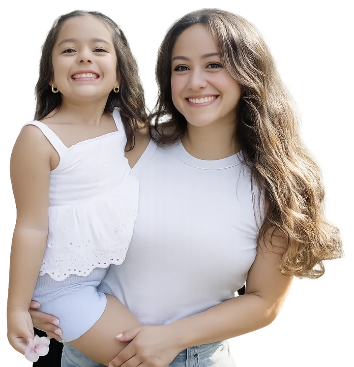 A smiling San Antonio mother holding her young daughter